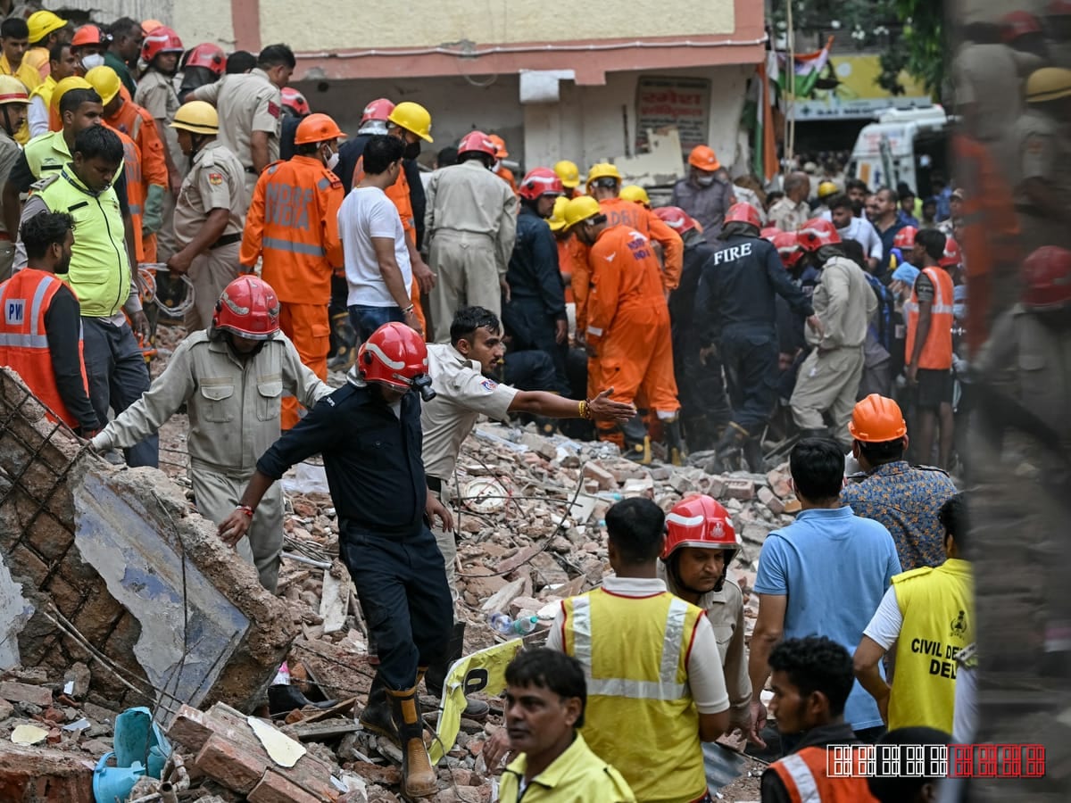 Delhi rescue crews comb rubble after six die in building collapse