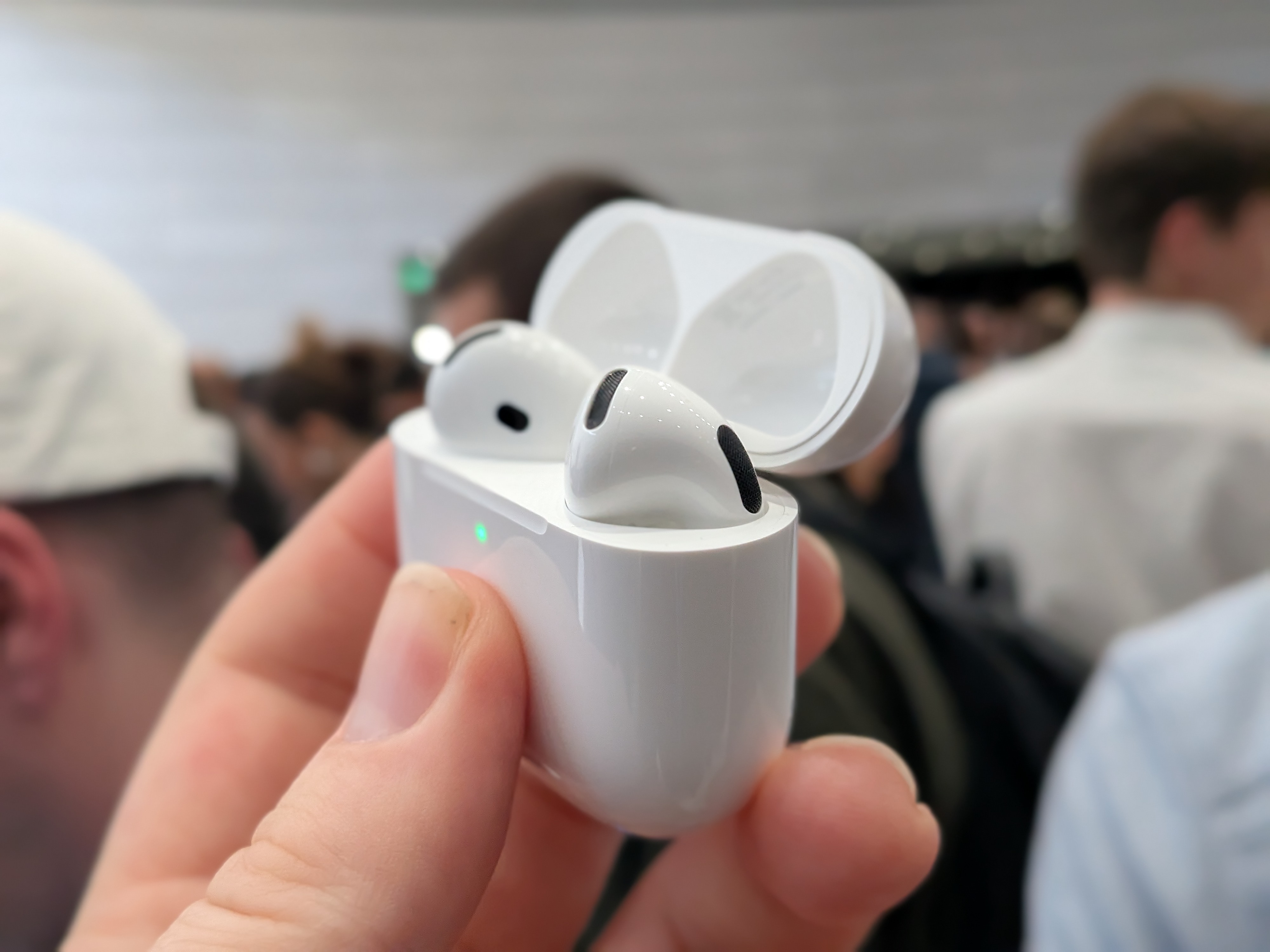 macOS Tahoe preview reveals video hinting at camera‑enabled AirPods