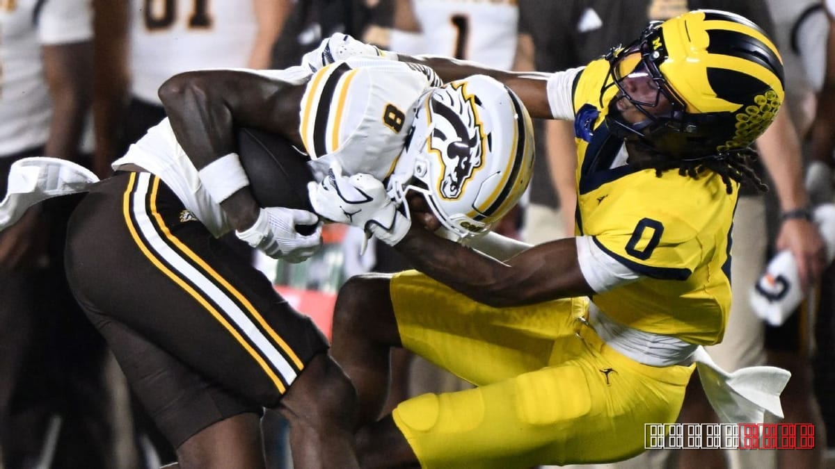 Michigan Escapes Upset with Last-Second Hail Mary Amid Controversial Review