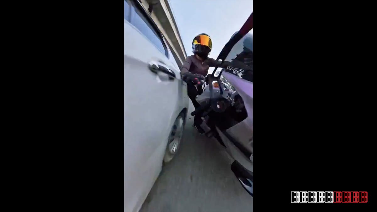 Police Probe Initiated After Viral Video Shows Car Slamming Female Biker in India
