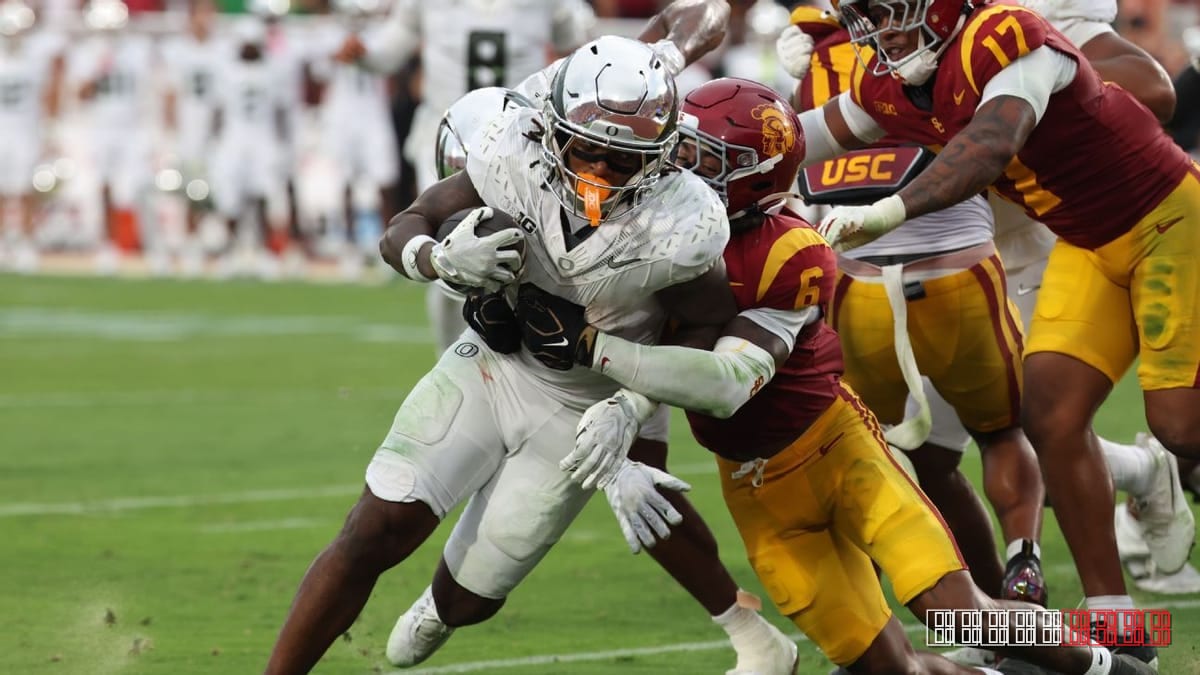 USC and Oregon clash as Iowa and Michigan headline college football action